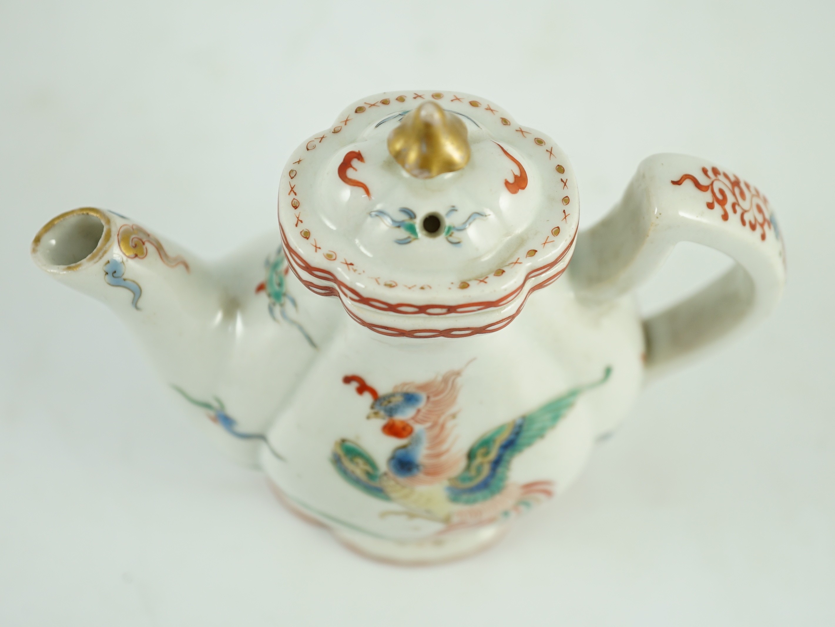 A small Japanese Arita kakiemon style water or teapot, possibly Edo period, 11 cms high, 10.8cm high